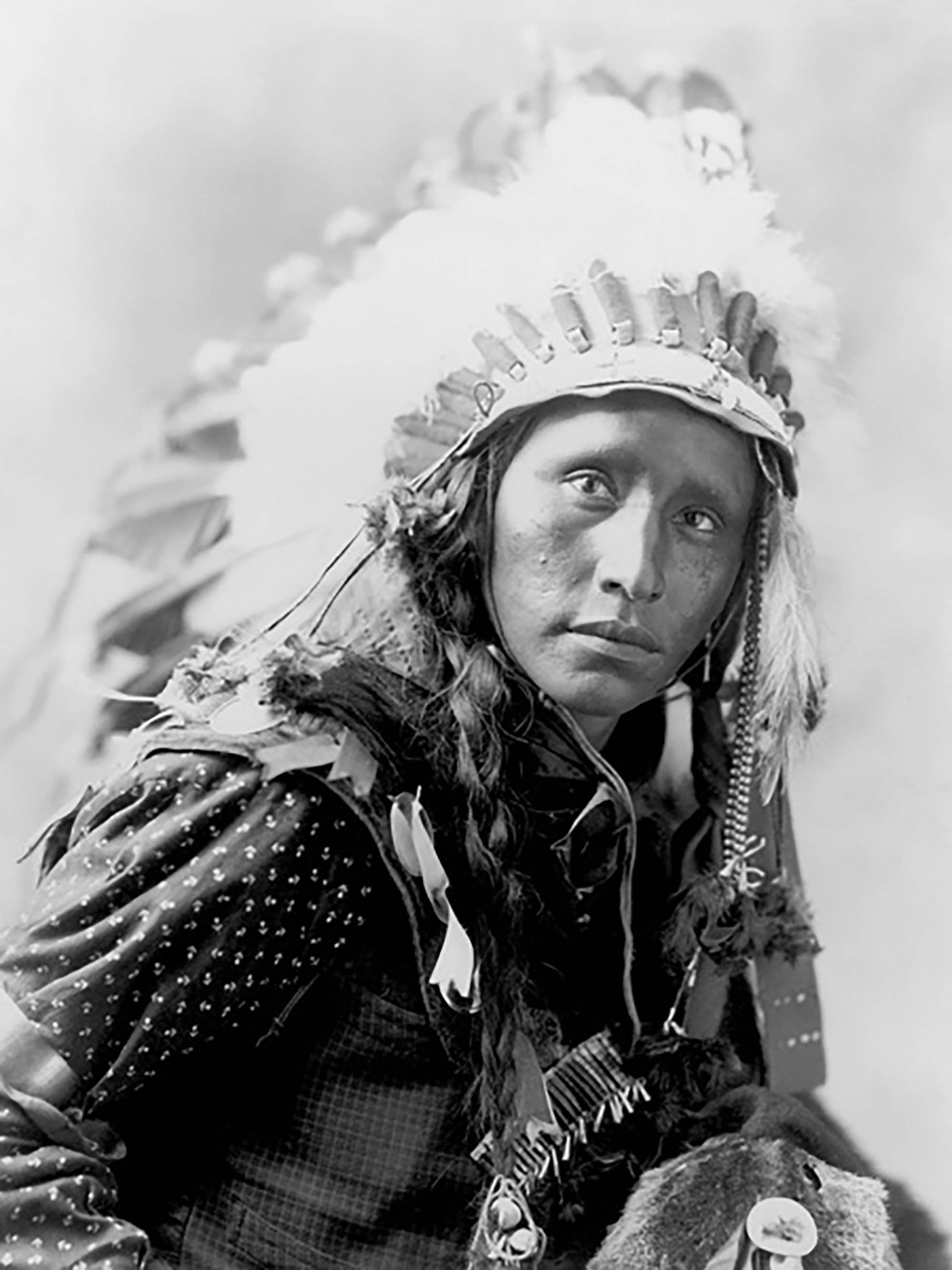 Indio con gorro de guerra blanco, 1900