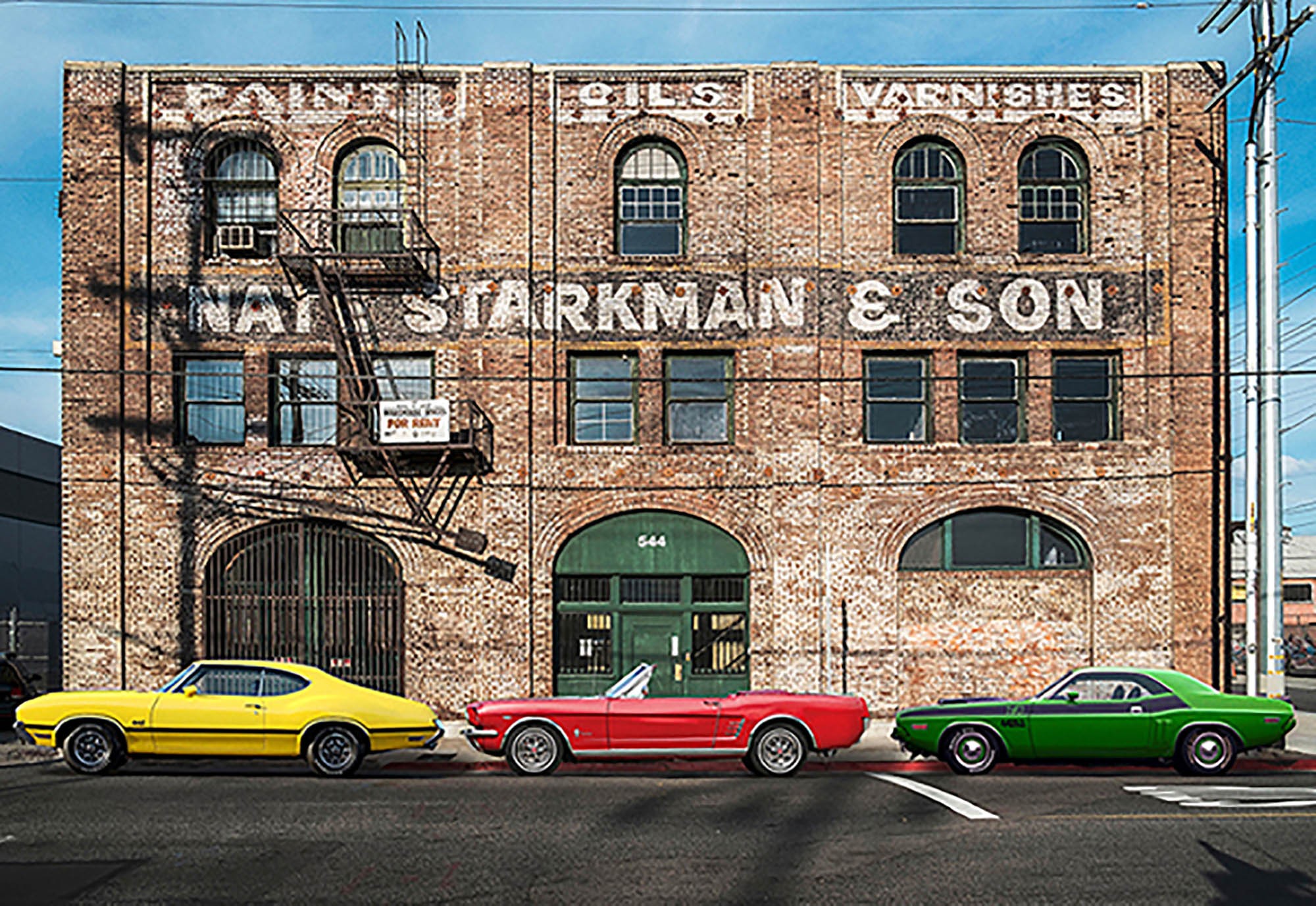 Paisaje urbano con muscle cars