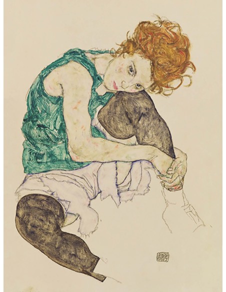 Mujer sentada con la rodilla doblada