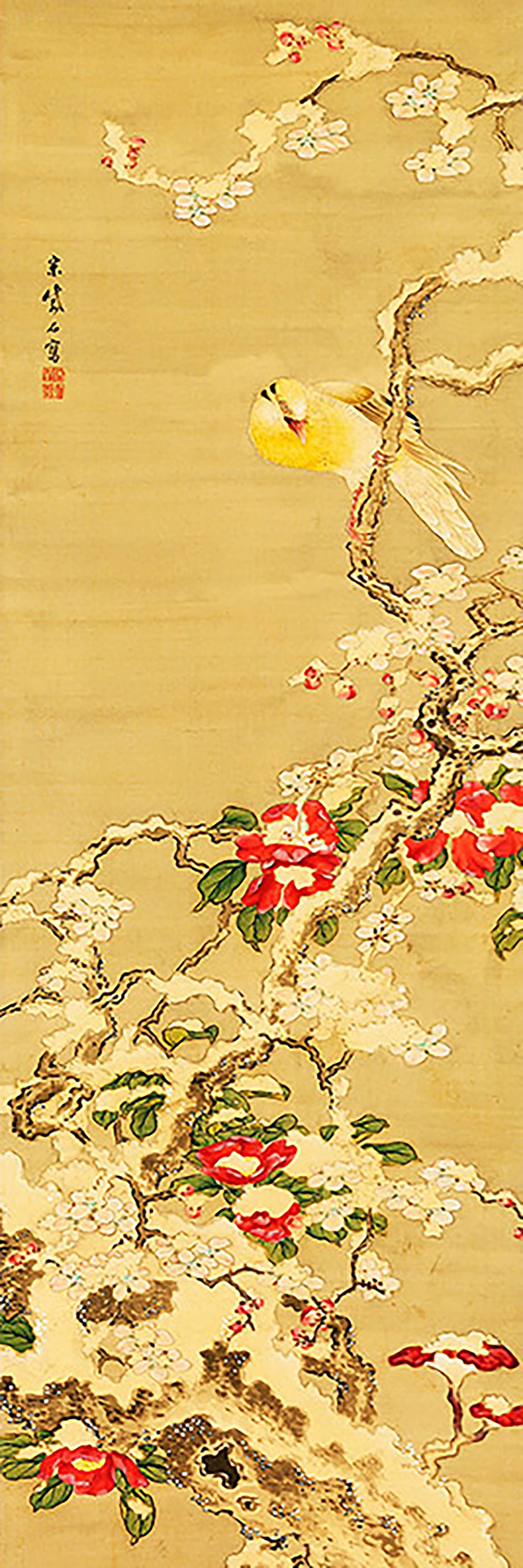 Pájaro entre camelias en la nieve