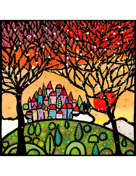 Los árboles miran el pueblo al atardecer.